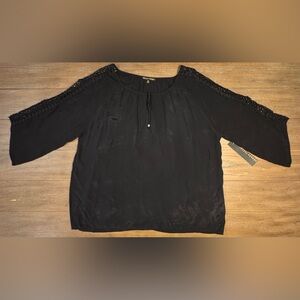 Elegant Black Blouse with Lace Sleeves